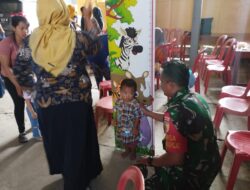 Wujud Babinsa Tawangrejo Dampingi Kegiatan Posyandu, Demi Tingkatkan Layanan Kesehatan Masyarakat